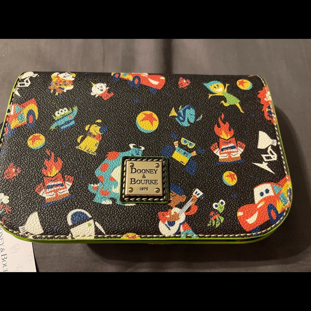 Super cute small Dooney and Bourke purse